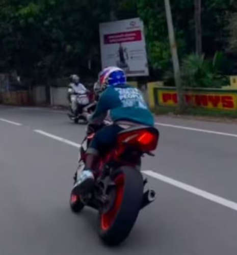 A young man who defied the police and performed stunts on the road was arrested