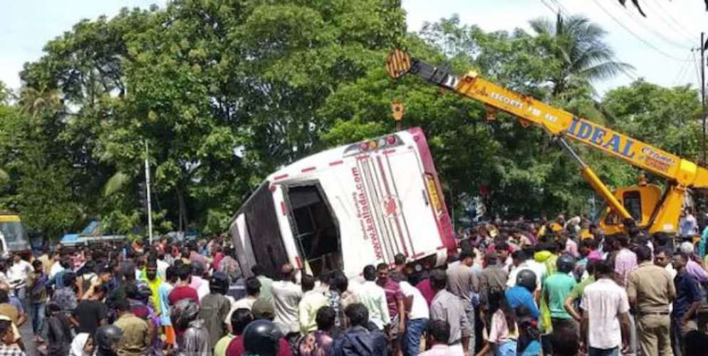 bus-overturns-after-hitting-traffic-signal-near-kochi