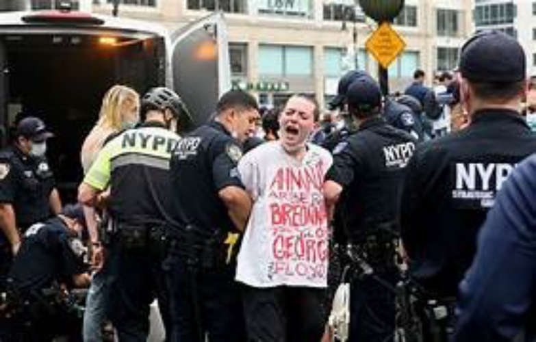 More than 90 arrests across the country as far-right protests turn violent