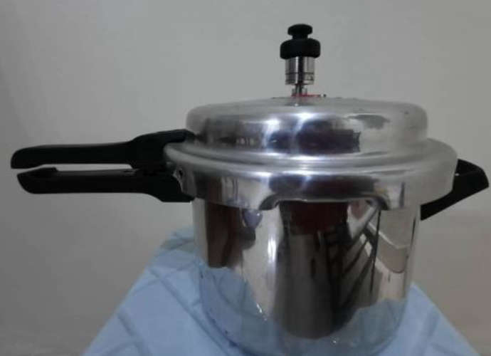 The cooker exploded and three people were injured