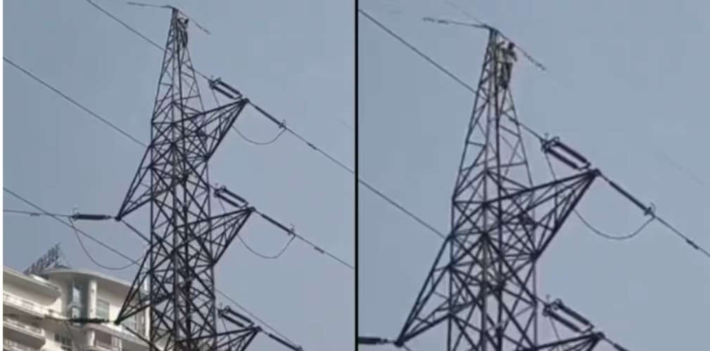 Dance practice of the young man climbing to the top of the high voltage electric tower It took two hours to get it down