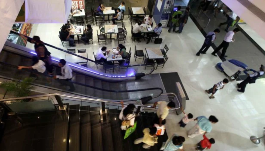 Three-year-old boy dies after slipping from escalator handrail in shopping mall