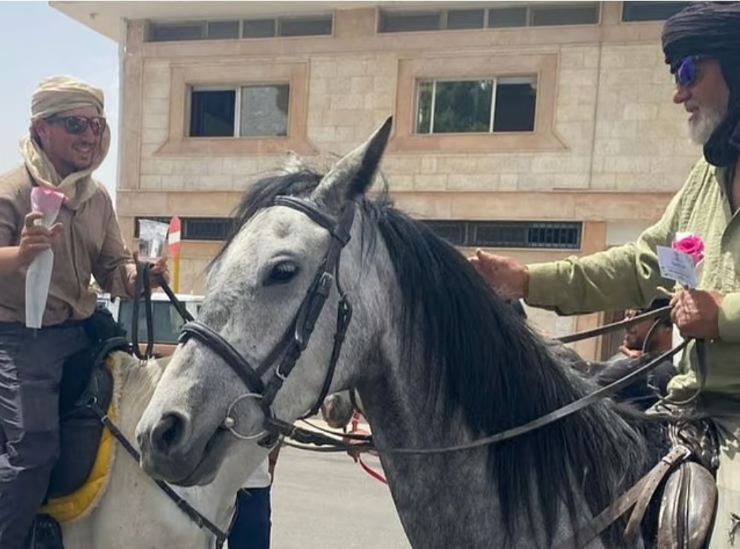 Pilgrims from Europe on horseback to perform Hajj Upon entering Saudi Arabia locals gave them a grand welcome with flowers and sweets