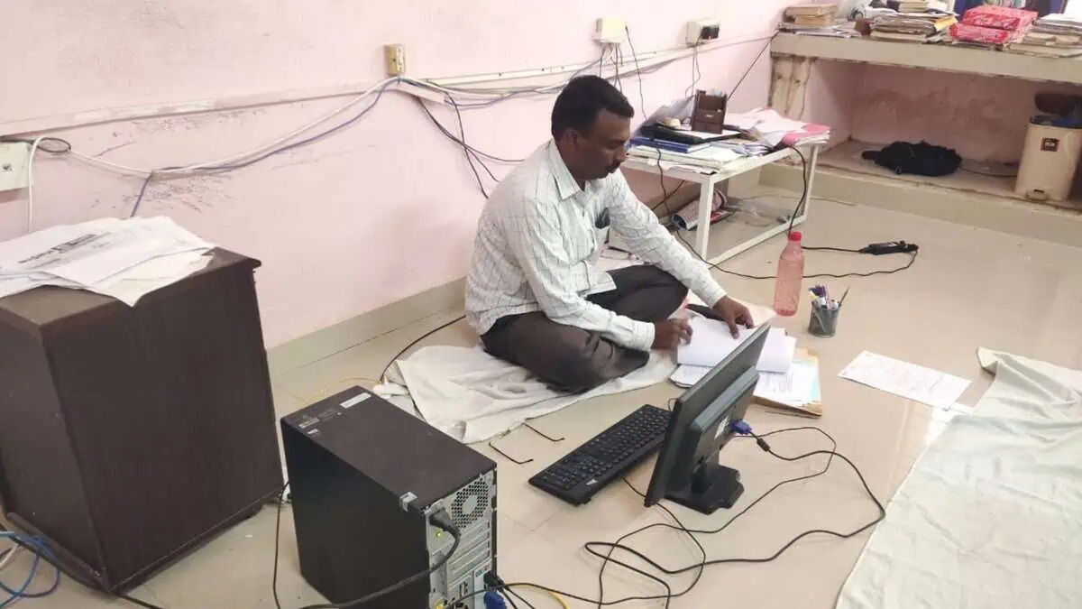 Dalit professor sits on floor at AP college after chair removed Protest continue