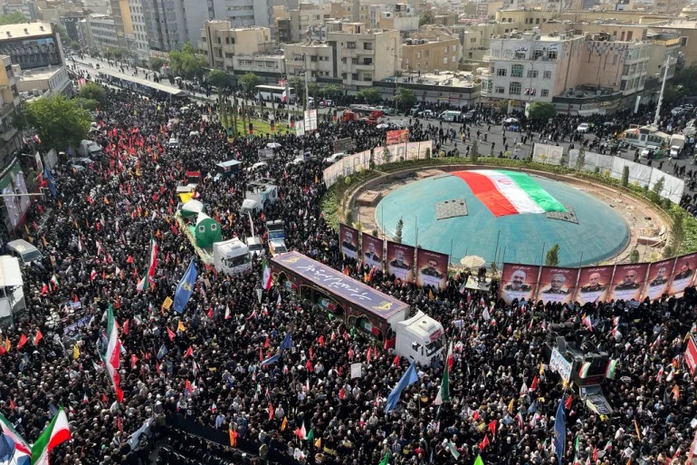 Iran holds state funeral for top commanders scientists killed by Israel attack