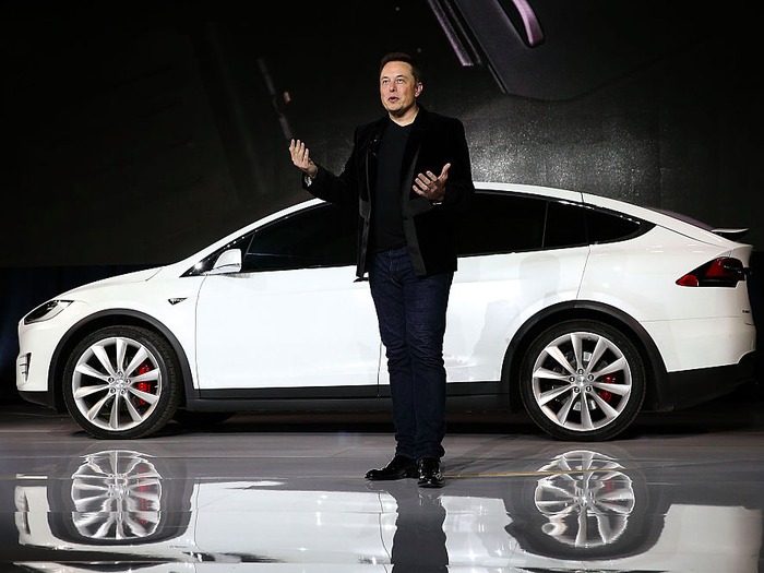 global electric vehicle giant tesla opens indias first showroom july 15