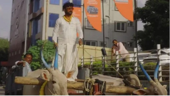 farmer arrives in bullock cart to buy 175 crore car gets grand welcome at showroom